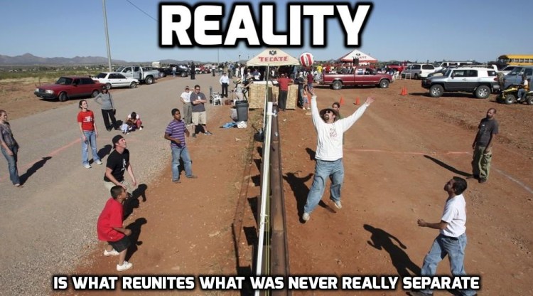 Residents of Naco, Arizona join residents of Naco, Mexico for a volleyball match during the fourth “Fiesta Bi-Nacional” at the US-Mexico border fence 